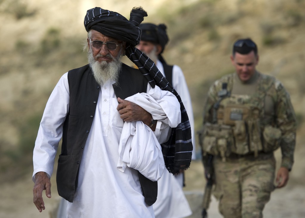 Mullah Tuti up at the dam above Shatowry with Captain Perkins in the background